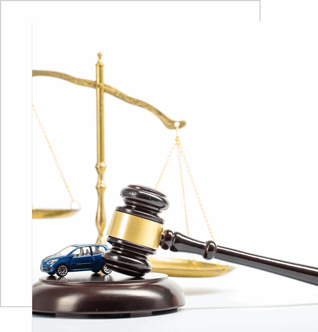 Gavel and toy car with scales