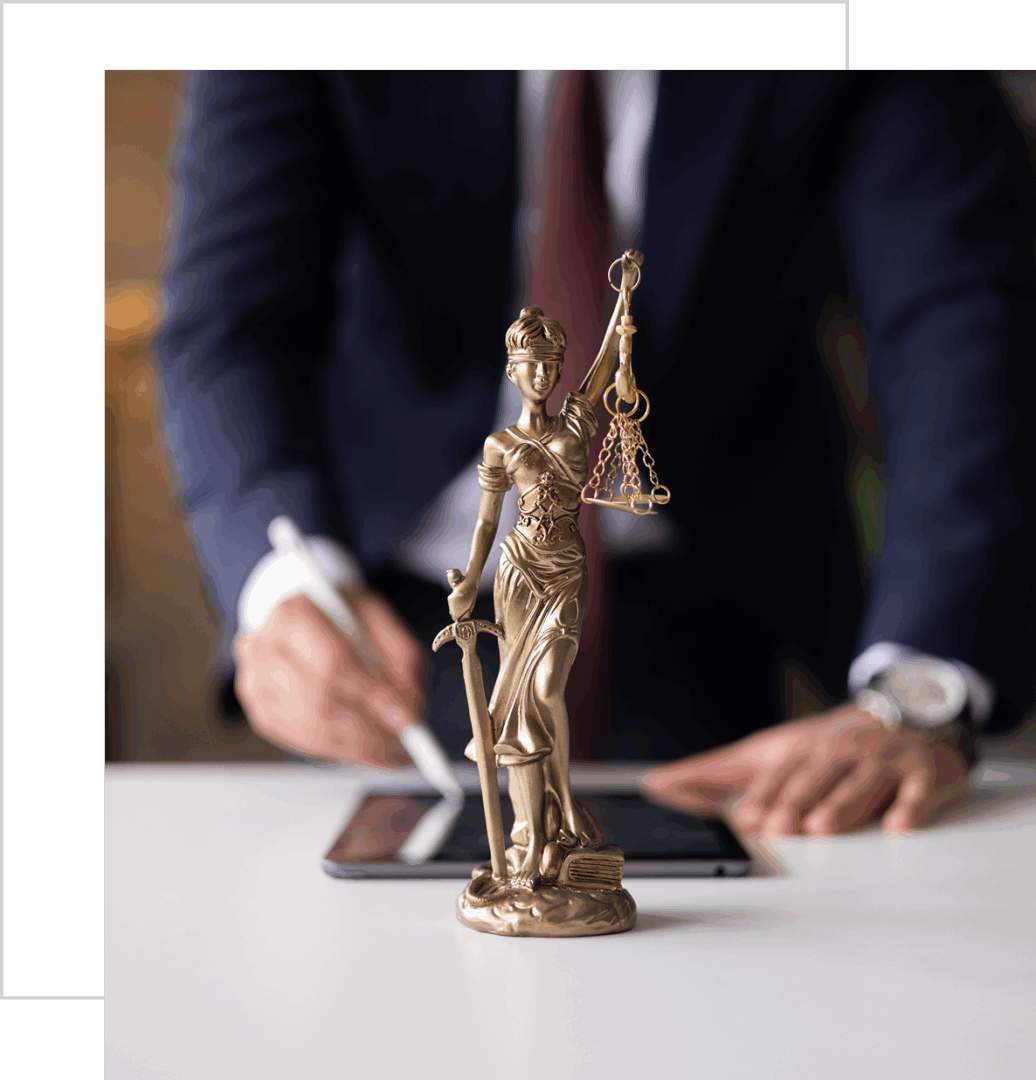 Justice statue with businessman in background