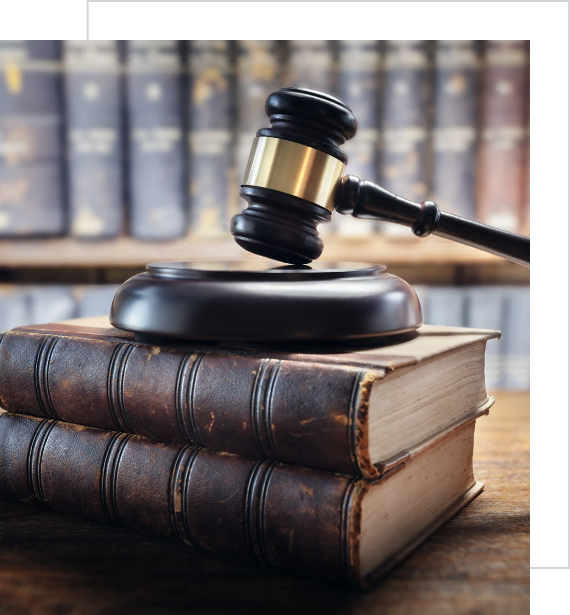 Legal gavel and books on desk