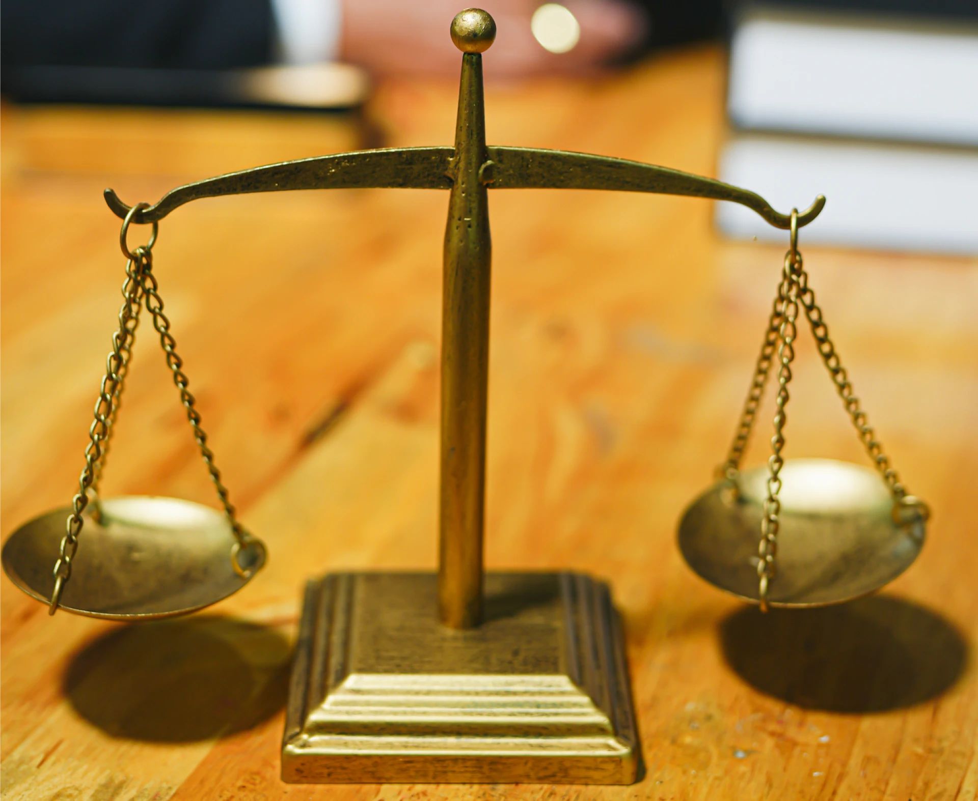 Symbolic justice scales on desk