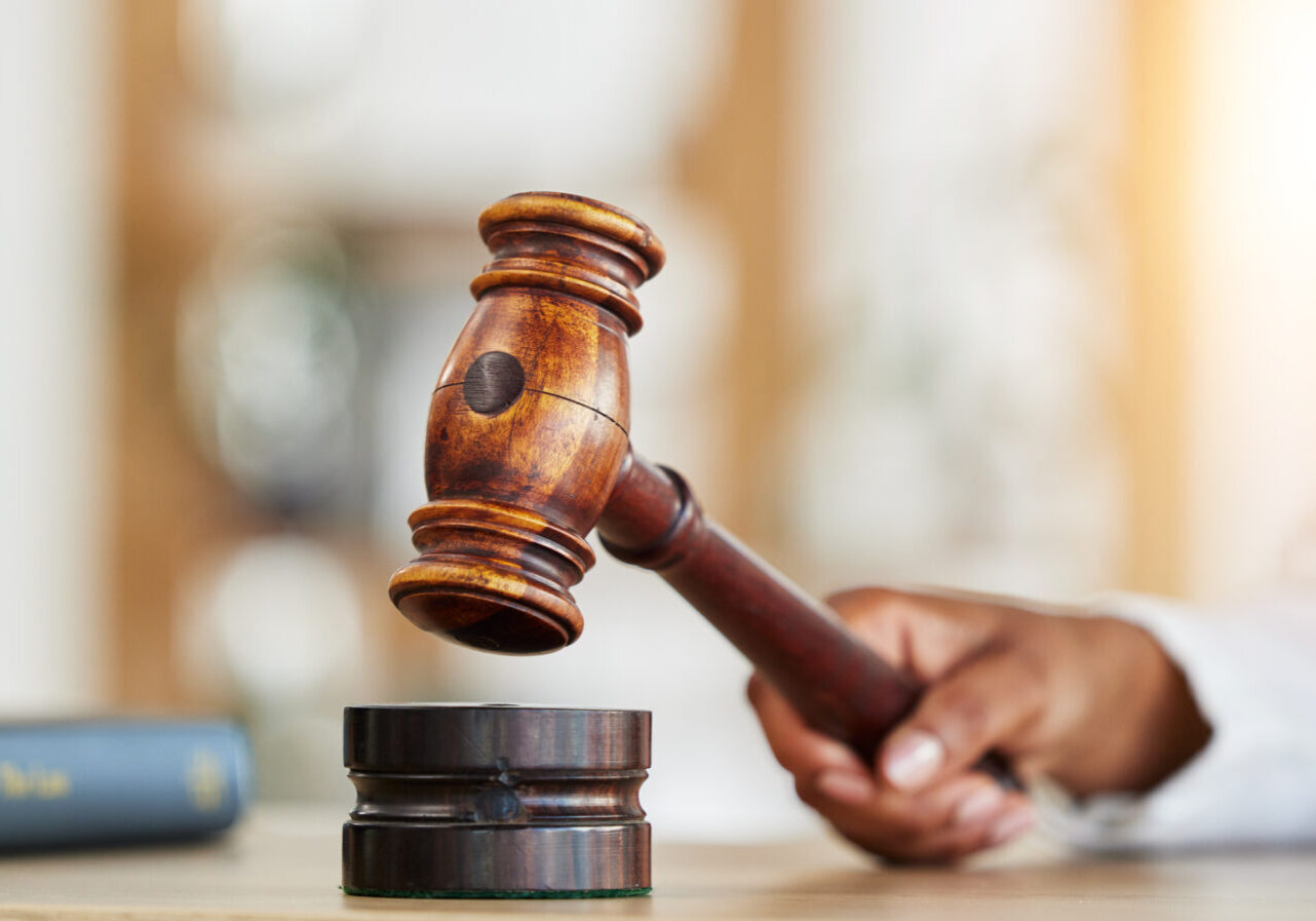 Wooden gavel on sound block
