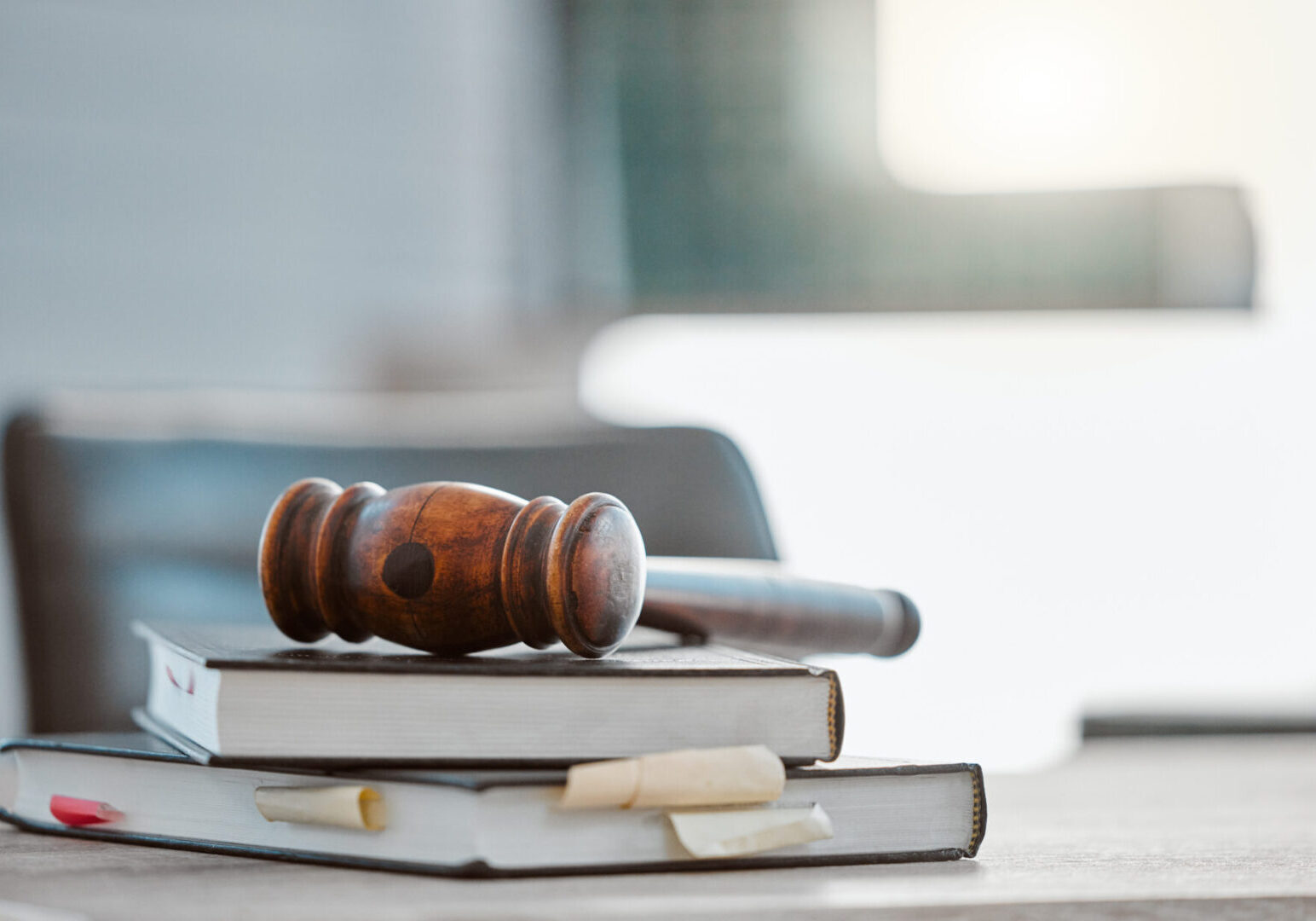 Legal books and wooden gavel