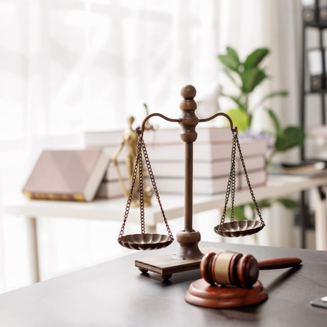 Scales of justice on office desk